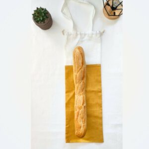 sac à pain bicolore jaune avec une baguette