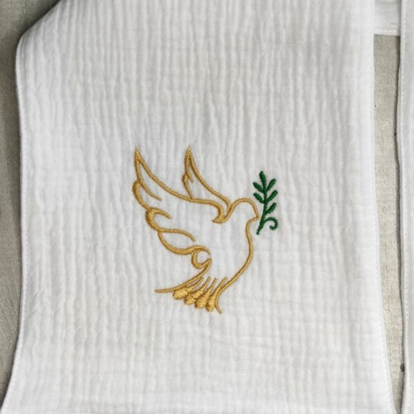 broderie d'une colombe dorée et d'un rameau vert