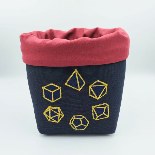 Panière à dés carré noire et rouge brodée avec un set de dés de jeu de rôle (d20, d12, d10, d8, d6, d4) en bleu