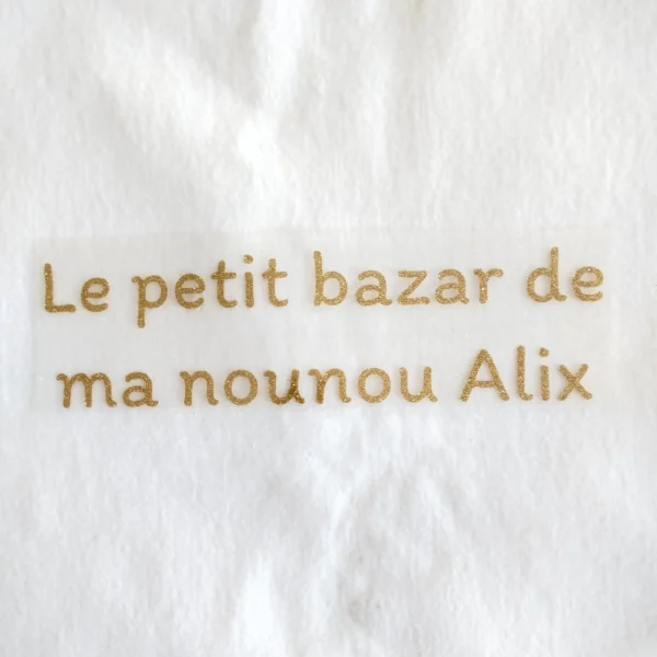 Texte personnalisable sur 2 lignes en flex thermocollant à paillettes