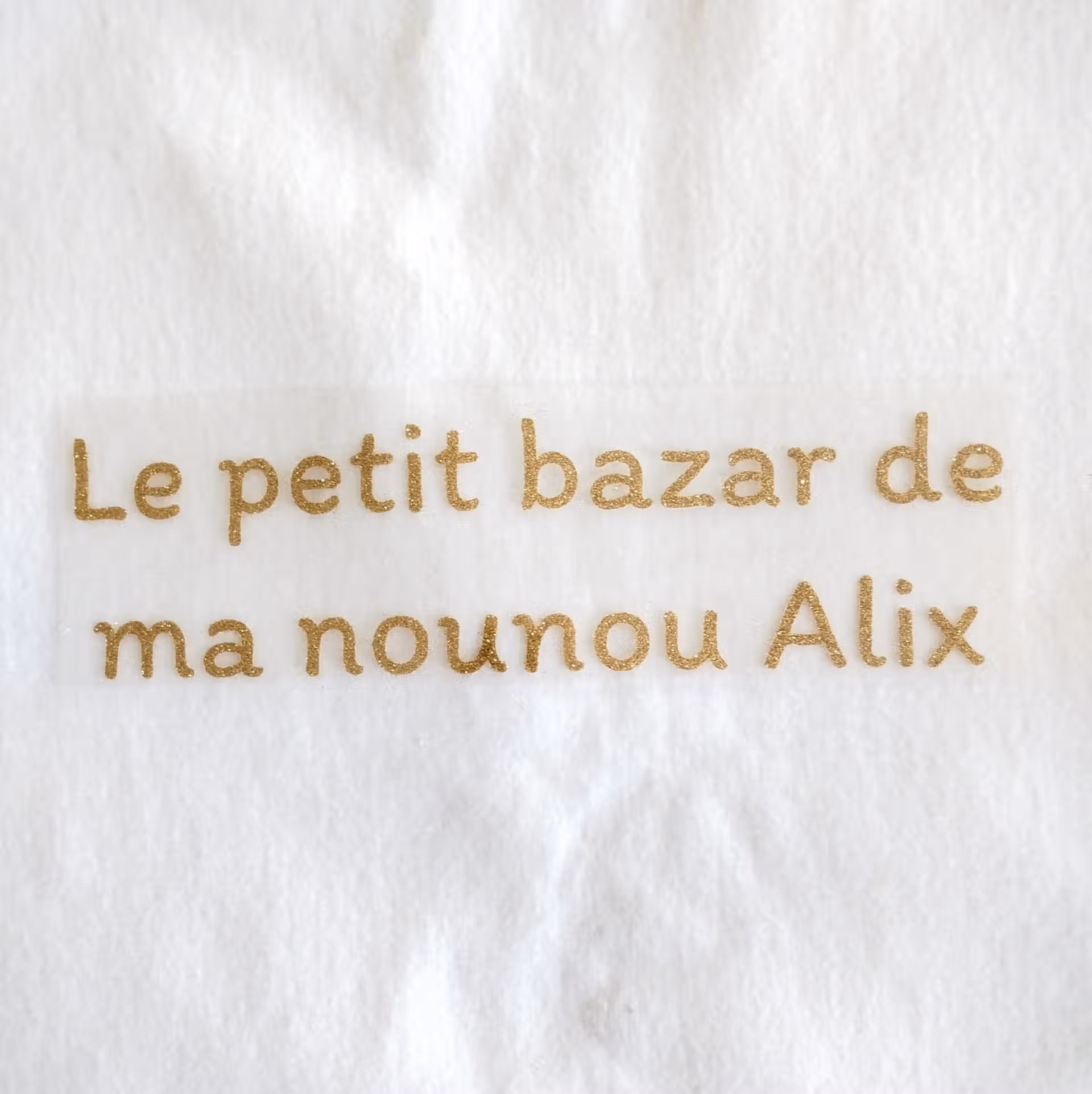 Texte personnalisable sur 2 lignes en flex thermocollant à paillettes