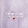 photo du flex fini j'ai une secret, il est dans le ventre de maman en blanc