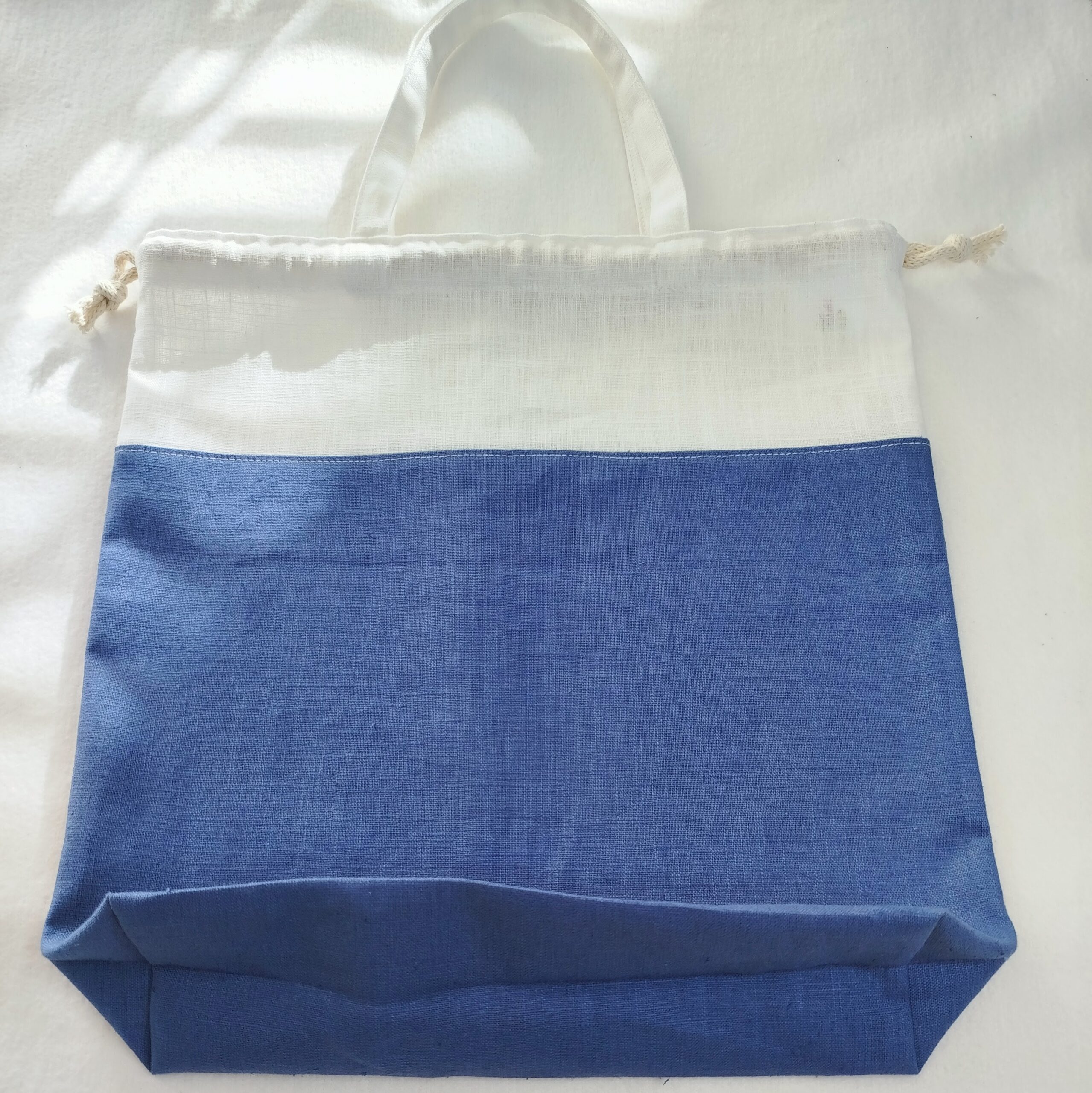 sac à pain rond bicolore bleu et écru