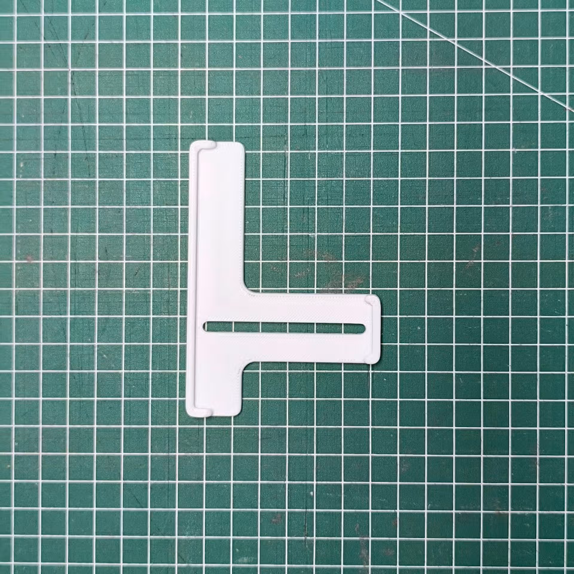 Guide de couture pour recouvreuse