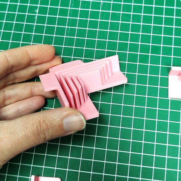 Guide d'angles pour la fabrication de boîte en carton