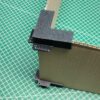 Guide d'angles pour la fabrication de boîte en carton