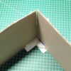 Guide d'angles pour la fabrication de boîte en carton