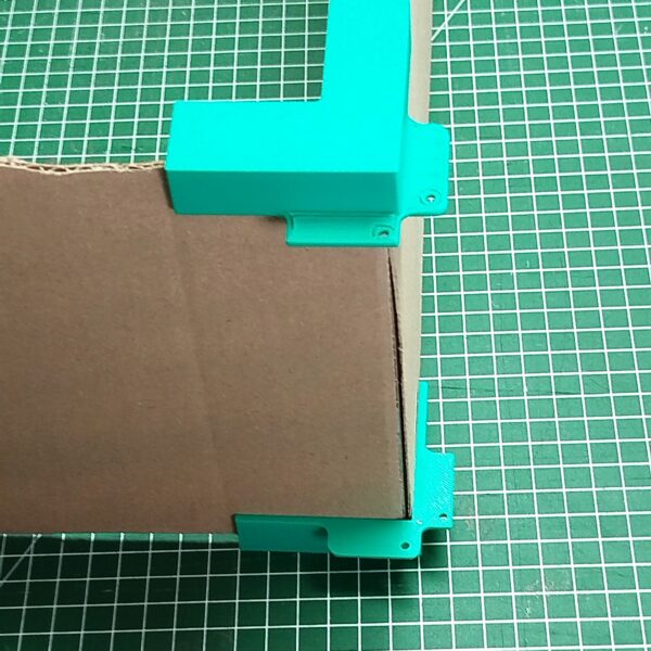 Guide d'angles pour la fabrication de boîte en carton
